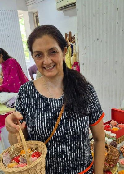 Kavya N. - Loved the sustainable n reusable basket with beautiful floral candles. - AGA KHAN HALL , NEW DELHI